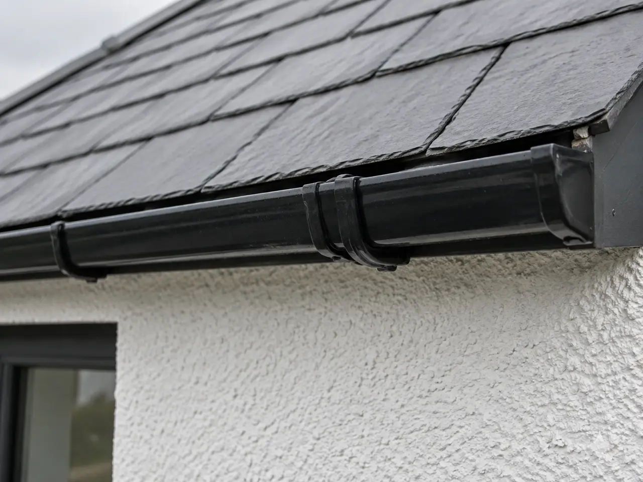 Black uPVC gutter union joint